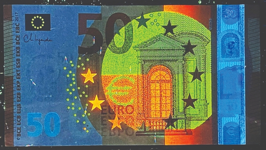 Công nghệ mực không màu phát quang trong in bảo an: Cơ sở khoa học và ứng dụng thực tiễn trên tiền và giấy tờ có giá trị